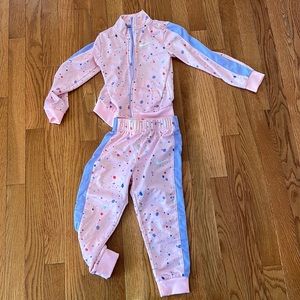 Nike track suit multi color. Pants and zip up sweater size 4T